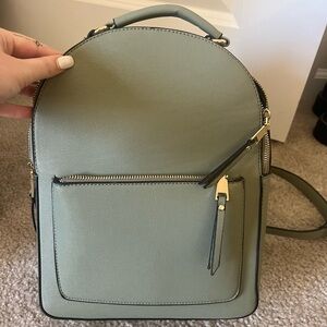 Green backpack adjustable straps